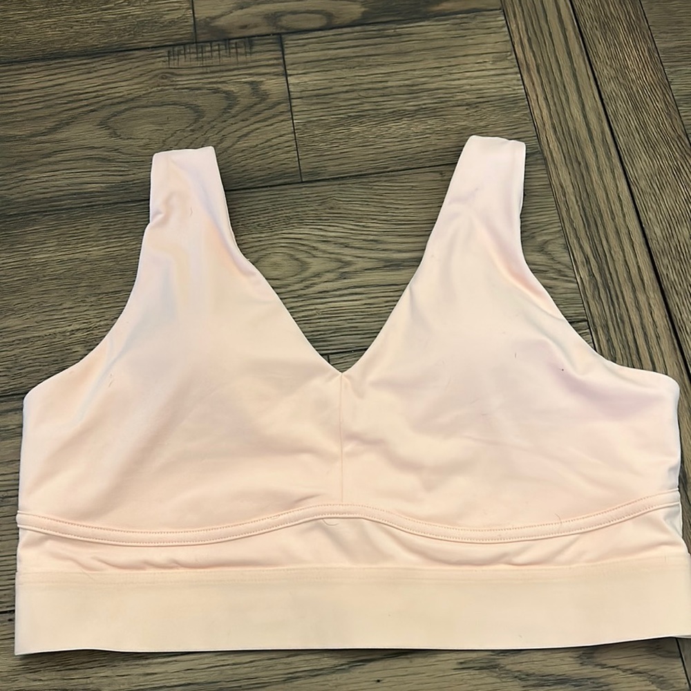 Slightly worn Fabletics sports bra. No tags. Has padded inserts in it